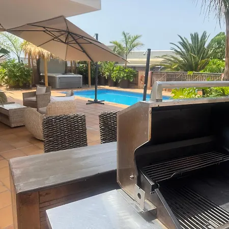 Villa Blossom In The Beautiful Area Of Puerto Santiago Tenerife With 5 Bedrooms For Up To 10 Guests Private Swimming Pool And Many Other Activities To Entertain The Family Secure Parking For 2 Cars And Disabled Access Throughout-3